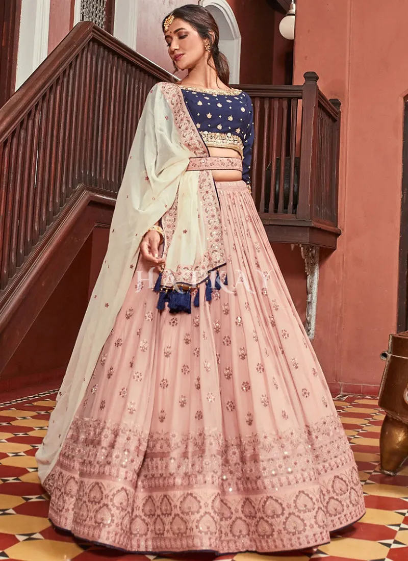 Peach And Blue Embroidered Georgette Lehenga Choli